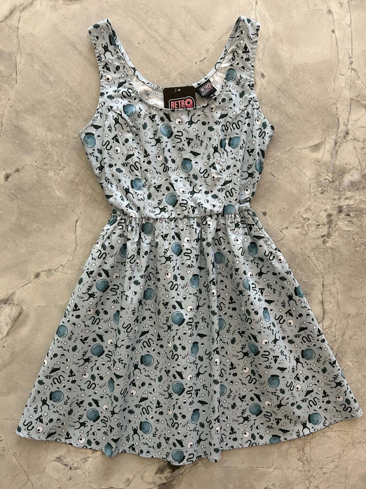 Made in USA. Shop the Witching Hour cotton fit-and-flare dress by Retrolicious, with a scoop neck, pockets and vintage-inspired style. Perfect for Halloween.