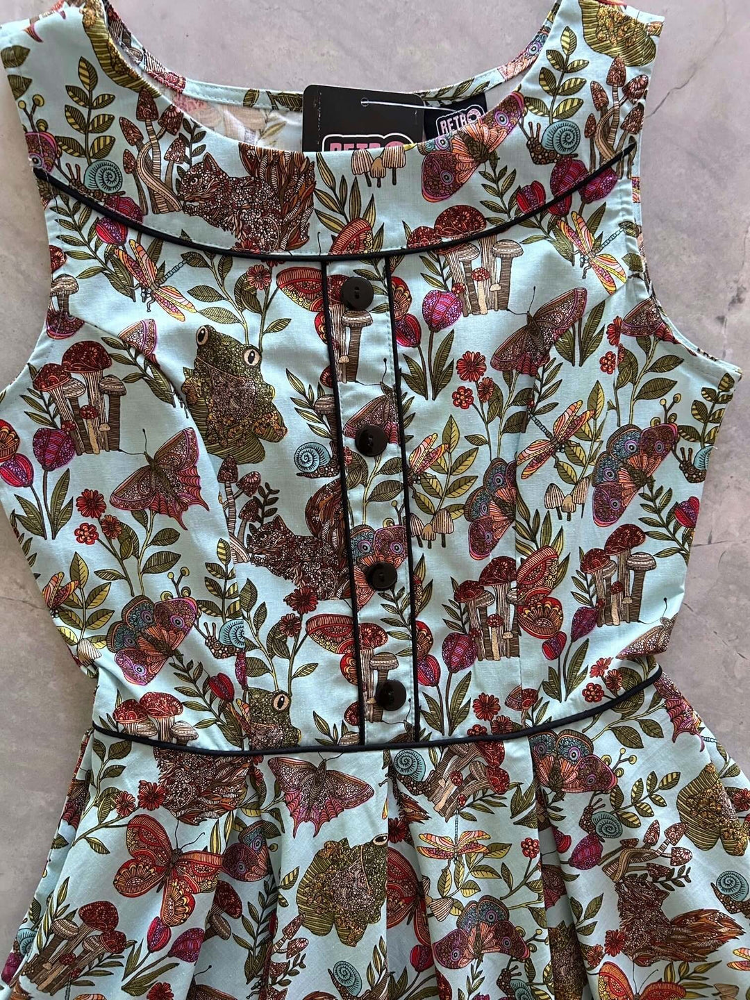 Vintage Style Dress Looking for a classic vintage style dress? Our Elizabeth cut with all its details is everything you could want and more! Shown in our Woodland Whimsy print, this cotton dress features piping details throughout the bodice