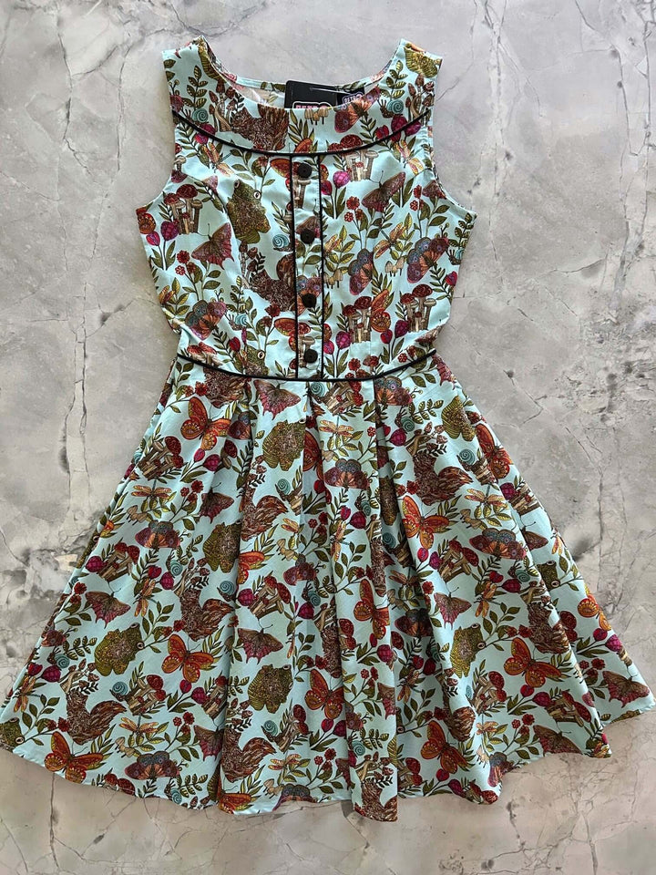 Vintage Style Dress Looking for a classic vintage style dress? Our Elizabeth cut with all its details is everything you could want and more! Shown in our Woodland Whimsy print, this cotton dress features piping details throughout the bodice
