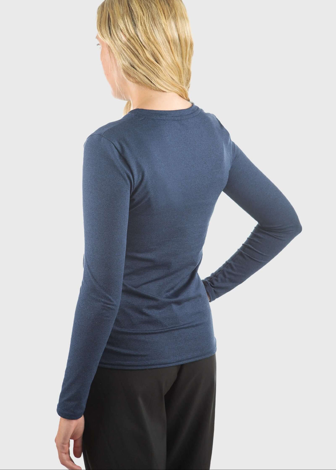 The SoftTECH™ Pro Top in Navy Blue delivers performance and comfort in one versatile piece. Engineered in USA with WSI Sportswear signature SoftTECH™ fabric, this top features a relaxed crew neck silhouette that moves with you through workouts and everyday wear. The lightweight, breathable construction keeps you cool during activity, while 4-way stretch ensures unrestricted movement in every direction. Built-in UPF 50 protection 