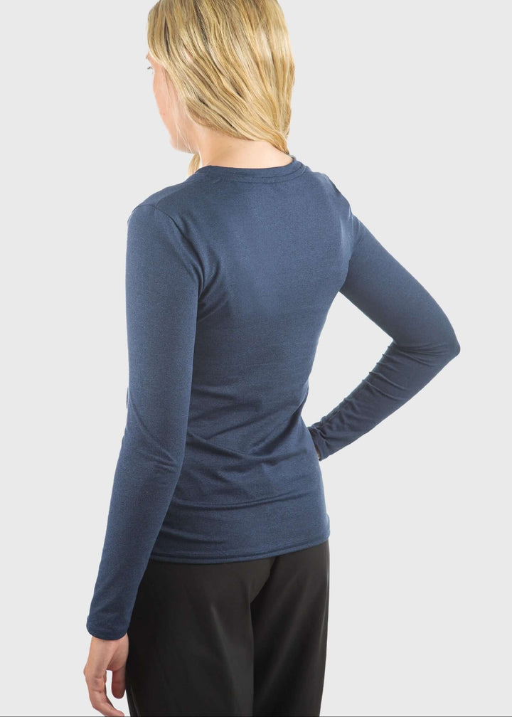 The SoftTECH™ Pro Top in Navy Blue delivers performance and comfort in one versatile piece. Engineered in USA with WSI Sportswear signature SoftTECH™ fabric, this top features a relaxed crew neck silhouette that moves with you through workouts and everyday wear. The lightweight, breathable construction keeps you cool during activity, while 4-way stretch ensures unrestricted movement in every direction. Built-in UPF 50 protection 