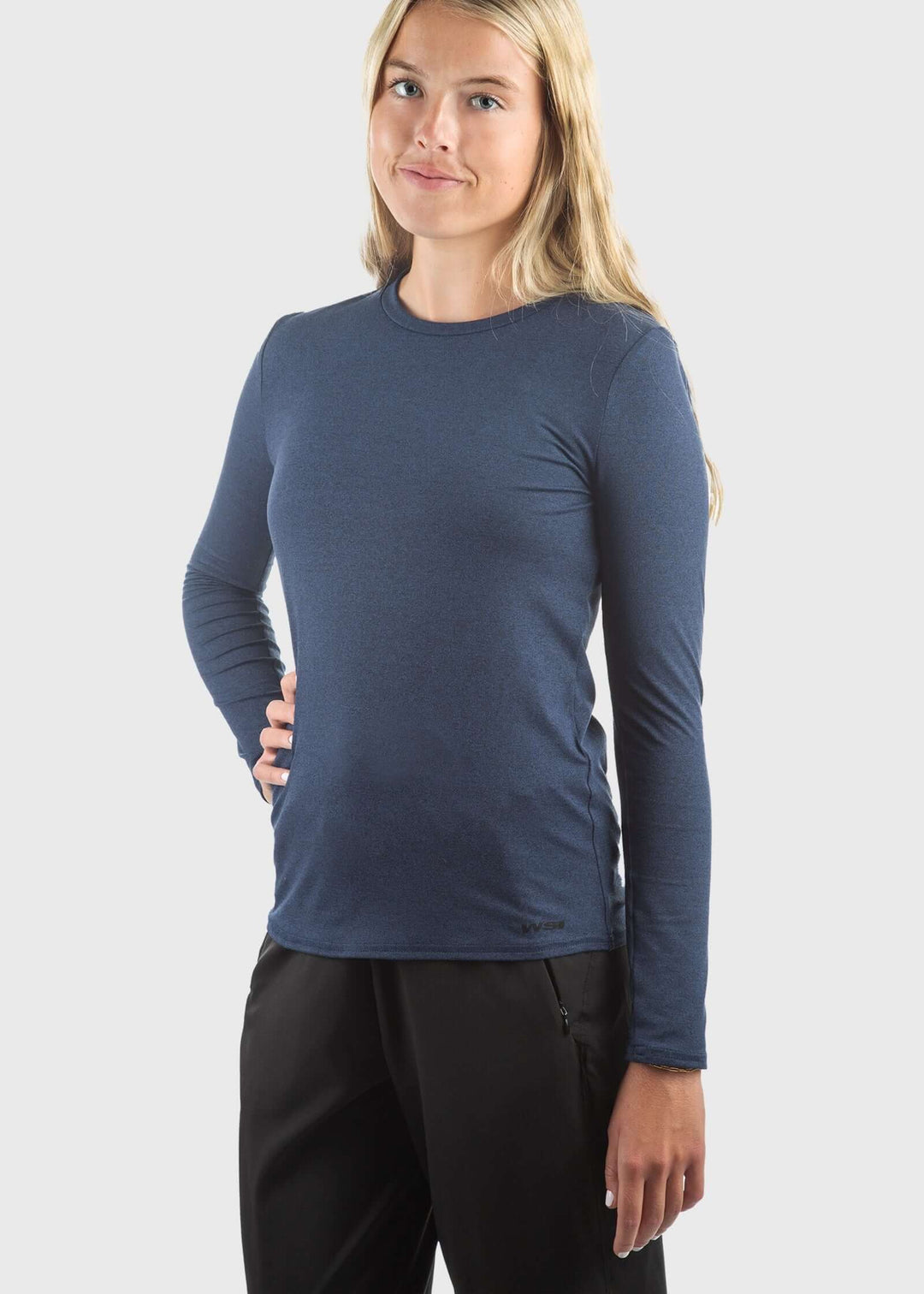 The SoftTECH™ Pro Top in Navy Blue delivers performance and comfort in one versatile piece. Engineered in USA with WSI Sportswear signature SoftTECH™ fabric, this top features a relaxed crew neck silhouette that moves with you through workouts and everyday wear. The lightweight, breathable construction keeps you cool during activity, while 4-way stretch ensures unrestricted movement in every direction. Built-in UPF 50 protection 