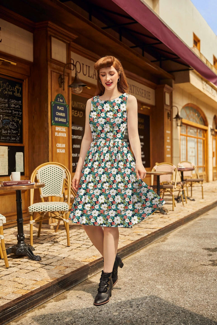Made in USA. Shop the Winter Floral Vintage Dress by Retrolicious in 100% cotton, with a high neckline, full skirt and hidden pockets. Sizes XS–4X.