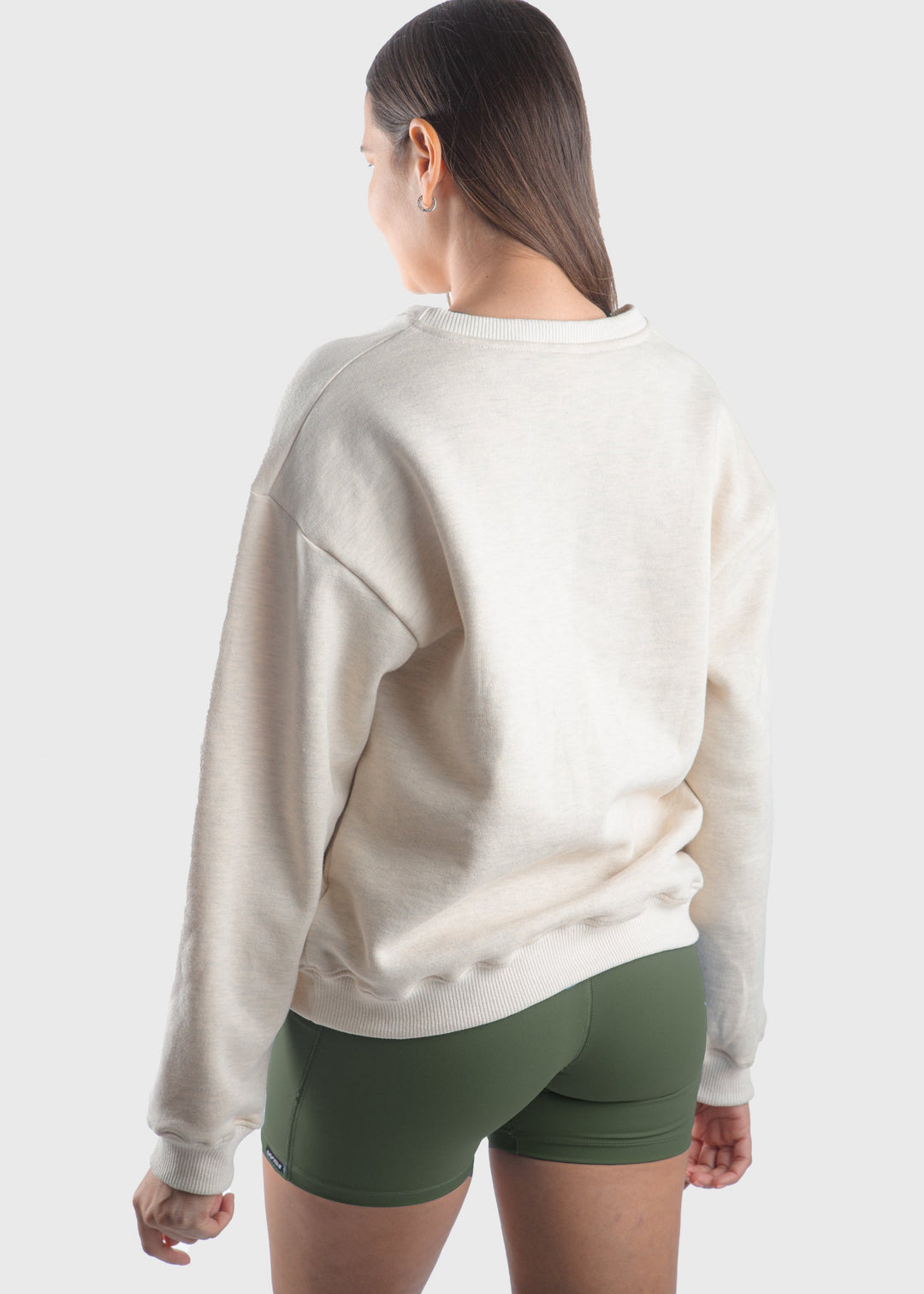 Experience all-day comfort with this USA Mid-Weight Fleece Sweatshirt. Crafted from a durable 14-ounce heavy-weight fleece, it offers warmth and breathability for cooler spring days. Featuring a loose fit, ribbed cuffs, and hem, this mid-layer is perfect for effortless layering. Show your pride with the classic white USA graphic, and enjoy the quality of a garment proudly made in the USA since 1990.