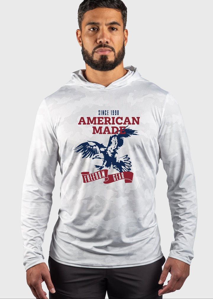 Experience superior comfort and protection with the American Made Eagle Mesh White Out Sun Hoodie. Crafted with performance mesh, this hoodie enhances breathability for optimal ventilation. Its built-in UPF 50 offers reliable sun protection, making it ideal for outdoor activities. Proudly made in the USA since 1990, it reflects quality craftsmanship and durability you can trust. This unisex design combines functionality with classic American manufacturing standards, perfect for staying cool and shielded und