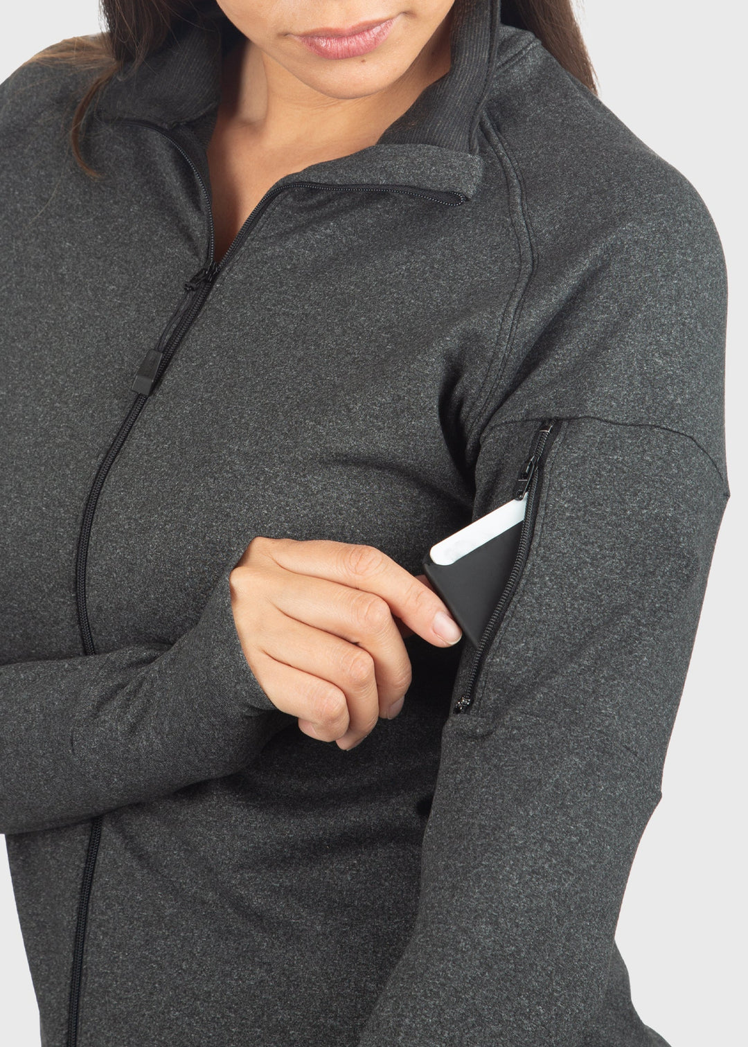 WSI’s warmest base layer shirt is designed to keep you comfortable in temperatures from -20° to 50°. Lined entirely with HEATR® fabric, it provides exceptional warmth throughout. This jacket features a full zip for easy layering, a handy sleeve pocket for essentials, and thumb holes for added warmth and comfort. Proudly made in the USA, it combines dependable quality with superior performance.