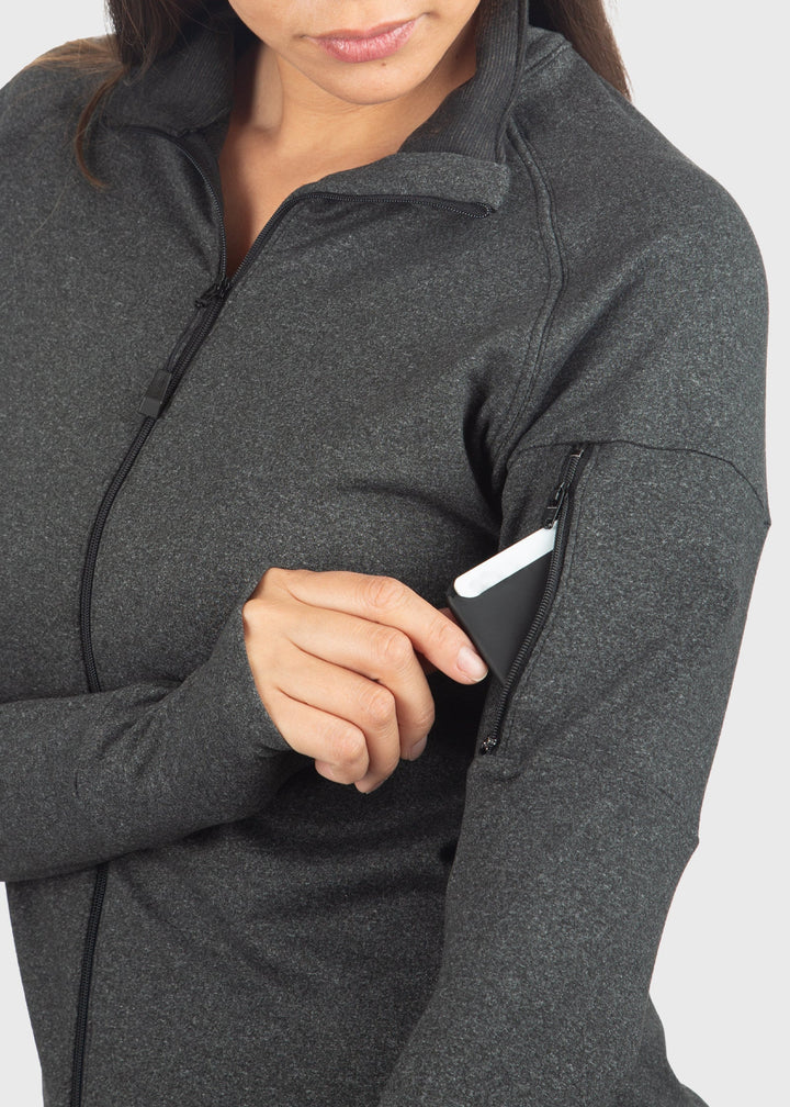 WSI’s warmest base layer shirt is designed to keep you comfortable in temperatures from -20° to 50°. Lined entirely with HEATR® fabric, it provides exceptional warmth throughout. This jacket features a full zip for easy layering, a handy sleeve pocket for essentials, and thumb holes for added warmth and comfort. Proudly made in the USA, it combines dependable quality with superior performance.