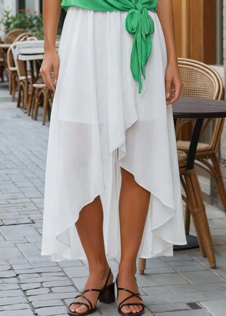 Elevate your everyday wardrobe with the Cascade High-Low Skirt in Ivory—a versatile piece that transitions seamlessly from casual to refined. Crafted from soft, lightweight satin washed twill, this maxi skirt drapes beautifully with a graceful cascading silhouette and striking high-low hem that flatters every stride. 