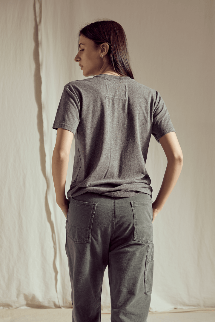 Celebrate the joy of the holiday season with the ultimate dose of nostalgia! Our Snoopy's Christmas Tree Tee captures the simple, heartwarming spirit of the beloved Peanuts gang. 