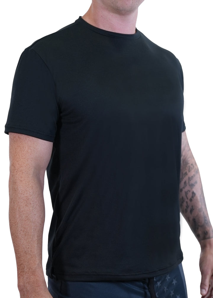 Experience unmatched comfort and performance with the SoftTECH™ Athletic Cut Tee. Crafted from super soft SoftTECH™ fabric, this lightweight short sleeve tee features a side notch for a better fit, making it ideal for all your spring activities. Designed for an athletic silhouette, it moves with you while keeping you comfortable all day long. Proudly made in the USA since 1990, this essential tee combines quality and style effortlessly. Elevate your everyday wardrobe with a shirt that delivers softness, dur