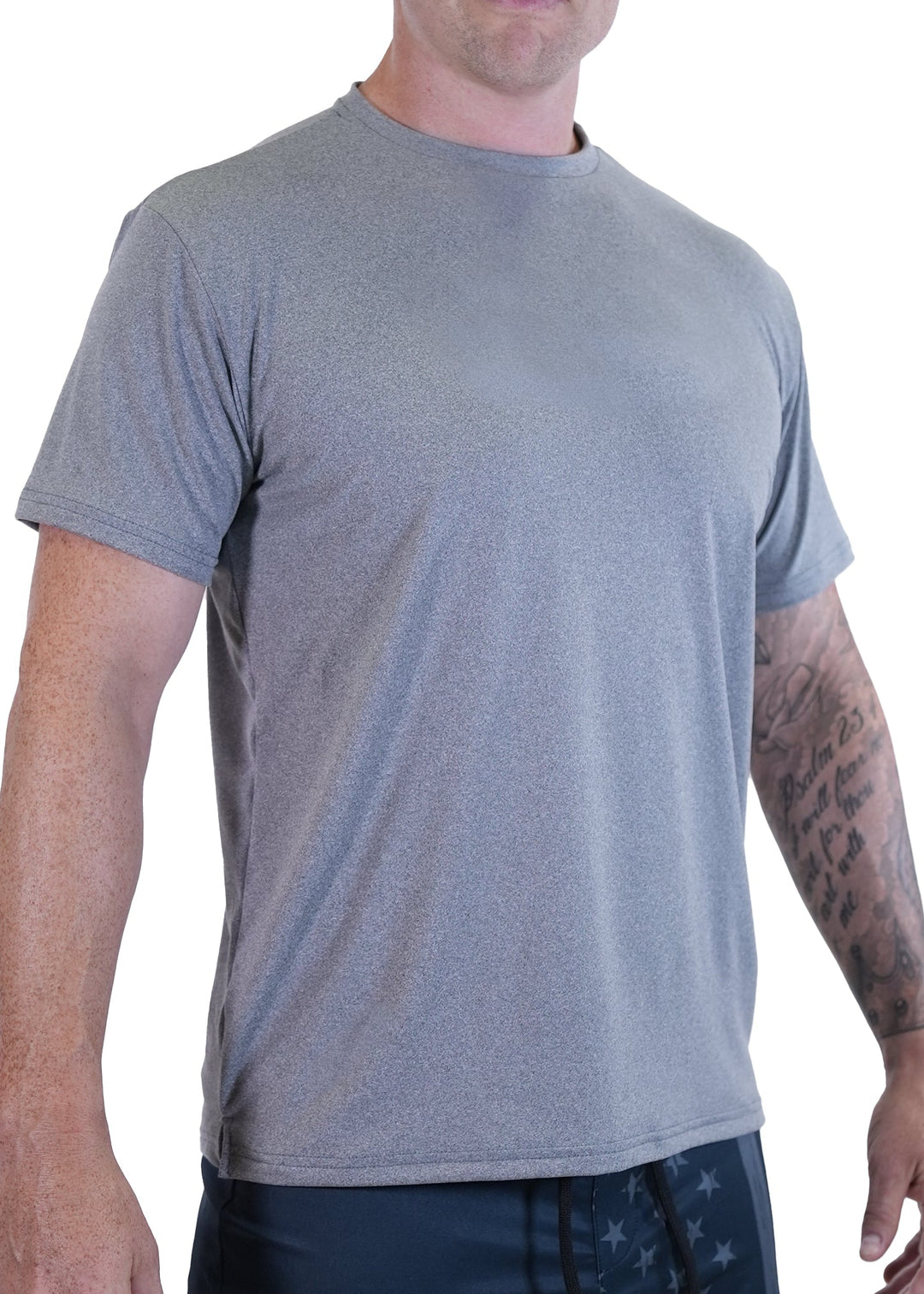 Experience unmatched comfort and performance with the SoftTECH™ Athletic Cut Tee. Crafted from super soft SoftTECH™ fabric, this lightweight short sleeve tee features a side notch for a better fit, making it ideal for all your spring activities. Designed for an athletic silhouette, it moves with you while keeping you comfortable all day long. Proudly made in the USA since 1990, this essential tee combines quality and style effortlessly. Elevate your everyday wardrobe with a shirt that delivers softness, dur