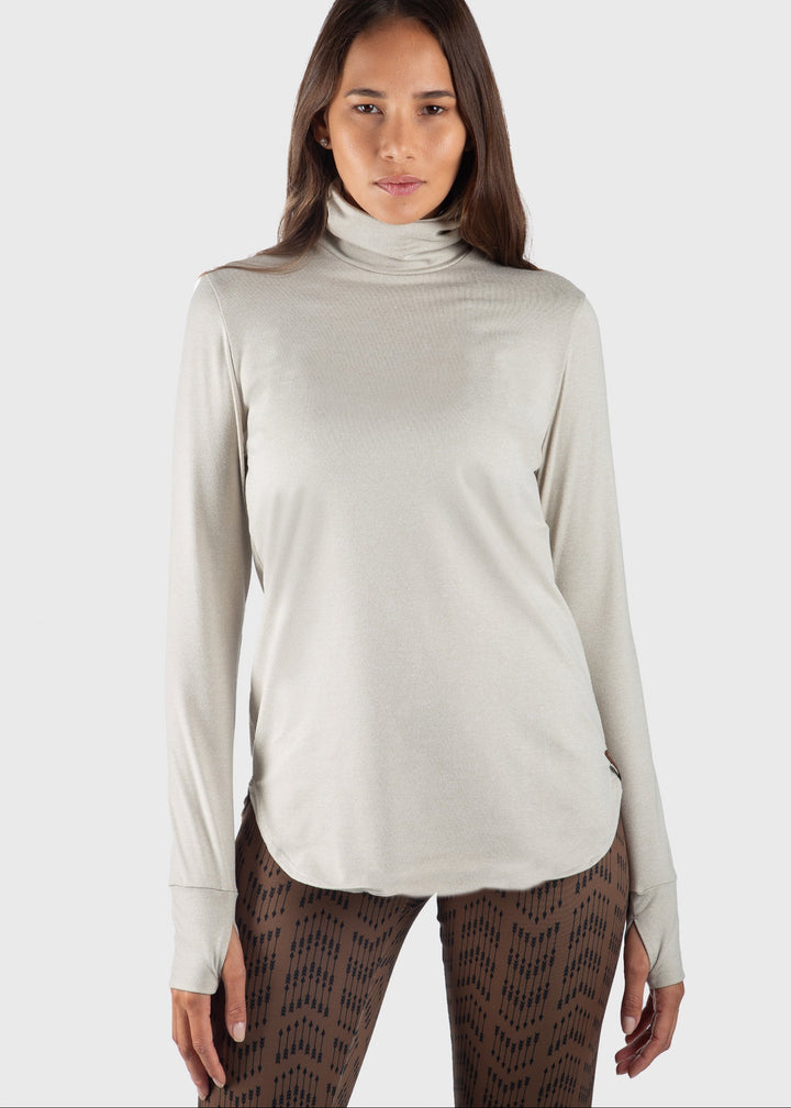 Experience unmatched warmth and comfort with the SoftTECH™ HEATR® Tunic by WSI Sportswear. Designed in the USA as a relaxed-fit base layer, it keeps you cozy in temperatures ranging from 0° to 75°F