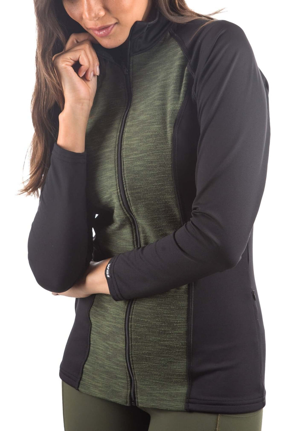 Made in USA Women's Moisture Wicking Full Zip Fitted Athletic Jacket, Machine wash, Advanced wicking properties, anti-microbial properties, and anti-snag technology ProWikMax™: 88% Polyester, 12% Spandex 4-way stretch compression for maximum comfort and performance WikMax™ material efficiently removes moisture from skin Antimicrobial technology inhibits bacterial growth and cuts down odor Brushed lining for soft hand and added warmth in Black and Army Green