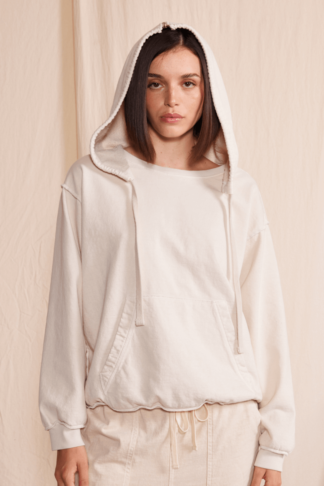 Stay cozy in our Midnight Hoodie, made with 100% heavy cotton for ultimate comfort. With a zip-up design and ribbed cuffs and waist, this relaxed fit hoodie is perfect for any adventure. 