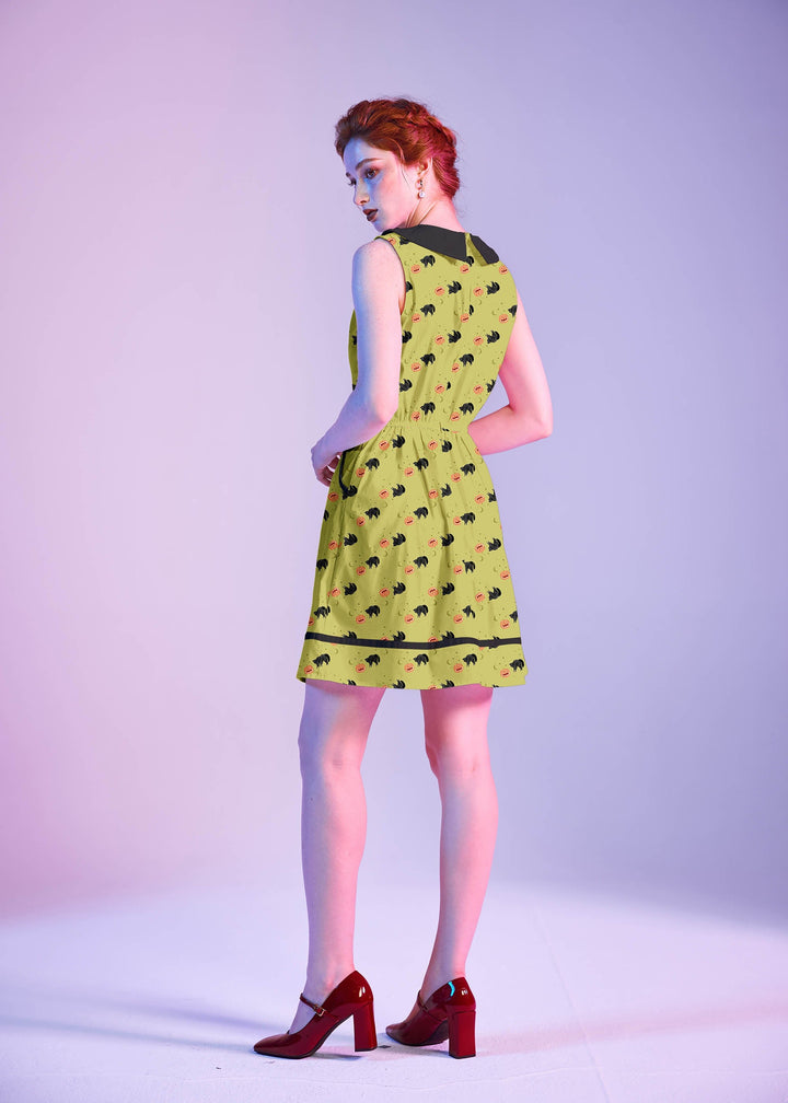 Made in USA. Shop the Black Cat Collared Dress by Retrolicious in 100% cotton, with a Peter Pan collar, contrast piping, A-line skirt and pockets.