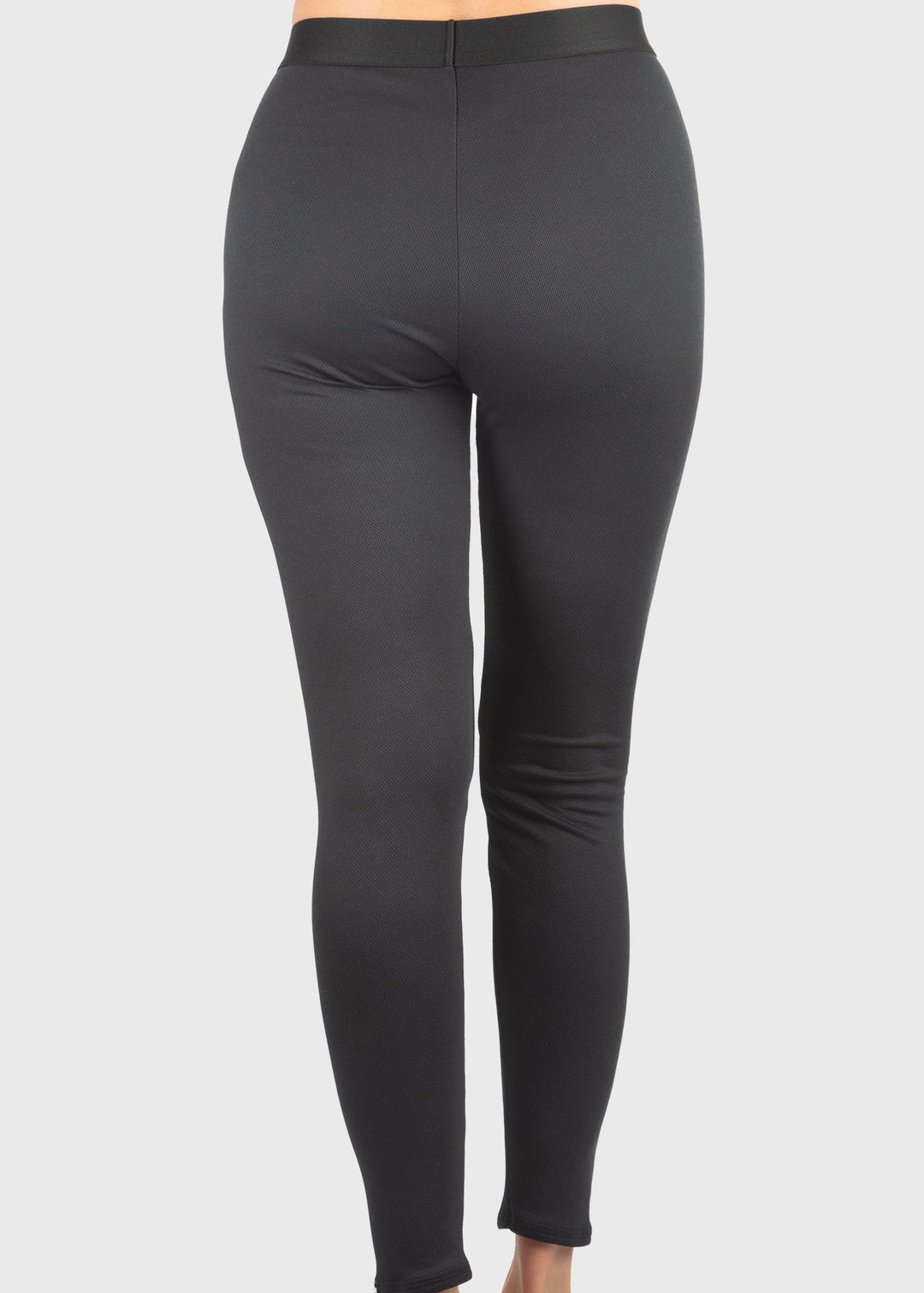 Experience unmatched warmth and comfort with the HEATR® Tundra Base Layer pant—our top-selling choice for lightweight, effective insulation. Designed without a women’s cut, this thin, flexible layer easily fits under any outfit, providing consistent heat from 0° to 75° F. The HEATR® technology integrated throughout the pant supports muscle recovery while keeping you dry and cozy during all your outdoor winter activities. Featuring an exposed waistband for added comfort, these base layer pants are ideal for 