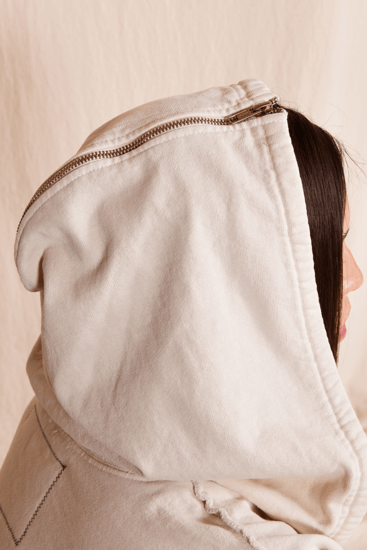 Stay cozy in our Midnight Hoodie, made with 100% heavy cotton for ultimate comfort. With a zip-up design and ribbed cuffs and waist, this relaxed fit hoodie is perfect for any adventure. 