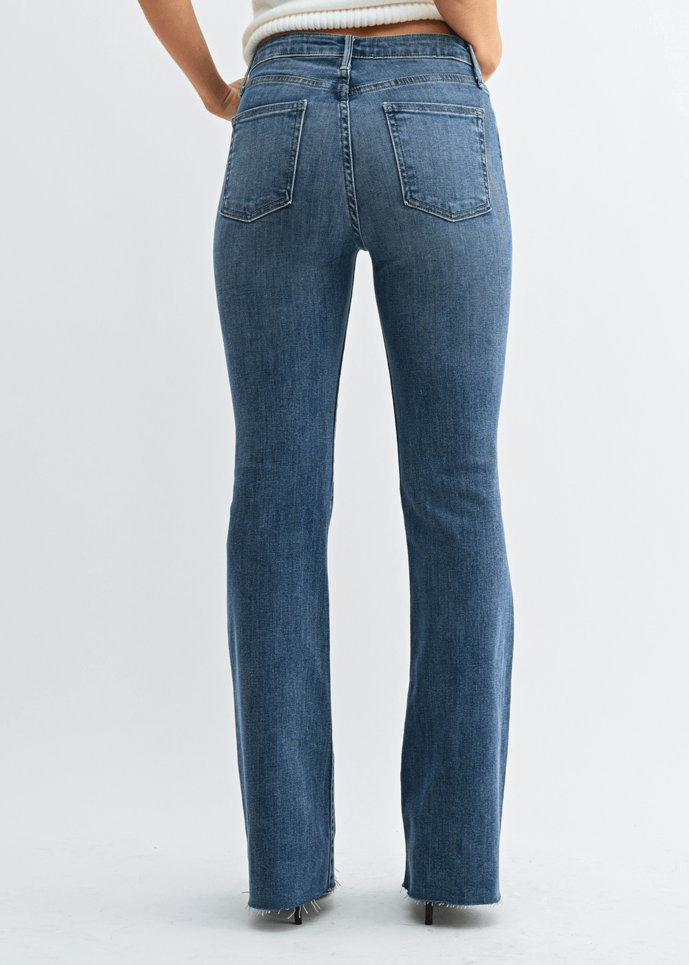 Shop women's high-rise fall flare jeans in medium denim with scissor-cut hem and stretch comfort. Made in USA by Just Black Denim. Sizes 24–31. Style BP333J
