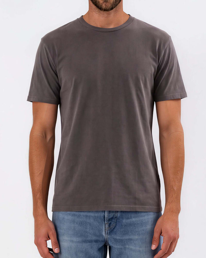 Made in USA Vintage Pigment Dyed Softest Tee - Charcoal: close-up front view of dark gray tee showing crew neck