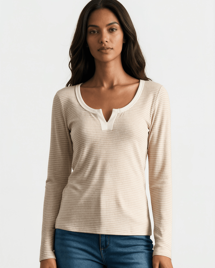 Made in USA. Taupe &amp; white striped fitted rib knit top. Split V-neck with contrast trim, long sleeves. 97% rayon. Sizes S–XL.