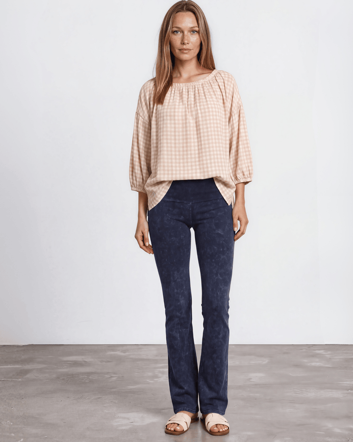 Rose gingham plaid woven peasant blouse with a stretchy elastic scoop neckline, 3/4 length puff sleeves with elasticized cuffs, and a relaxed flowy silhouette in 100% rayon. Made in USA