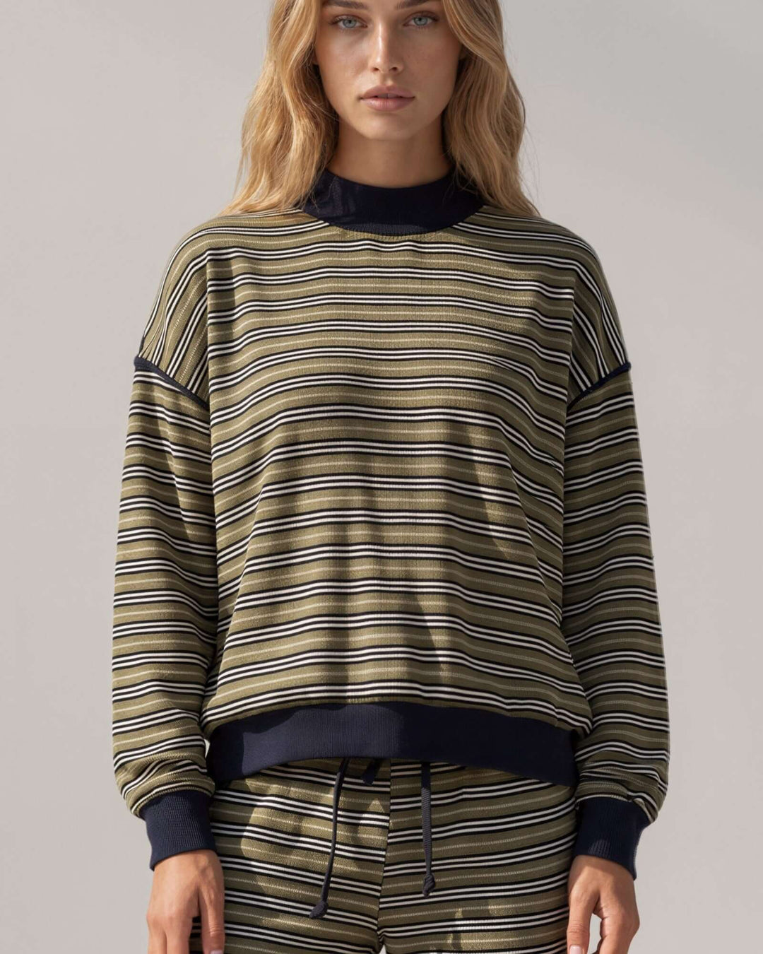 Made in USA women's olive and navy striped relaxed fit crewneck long sleeve top with ribbed trim, close-up front view