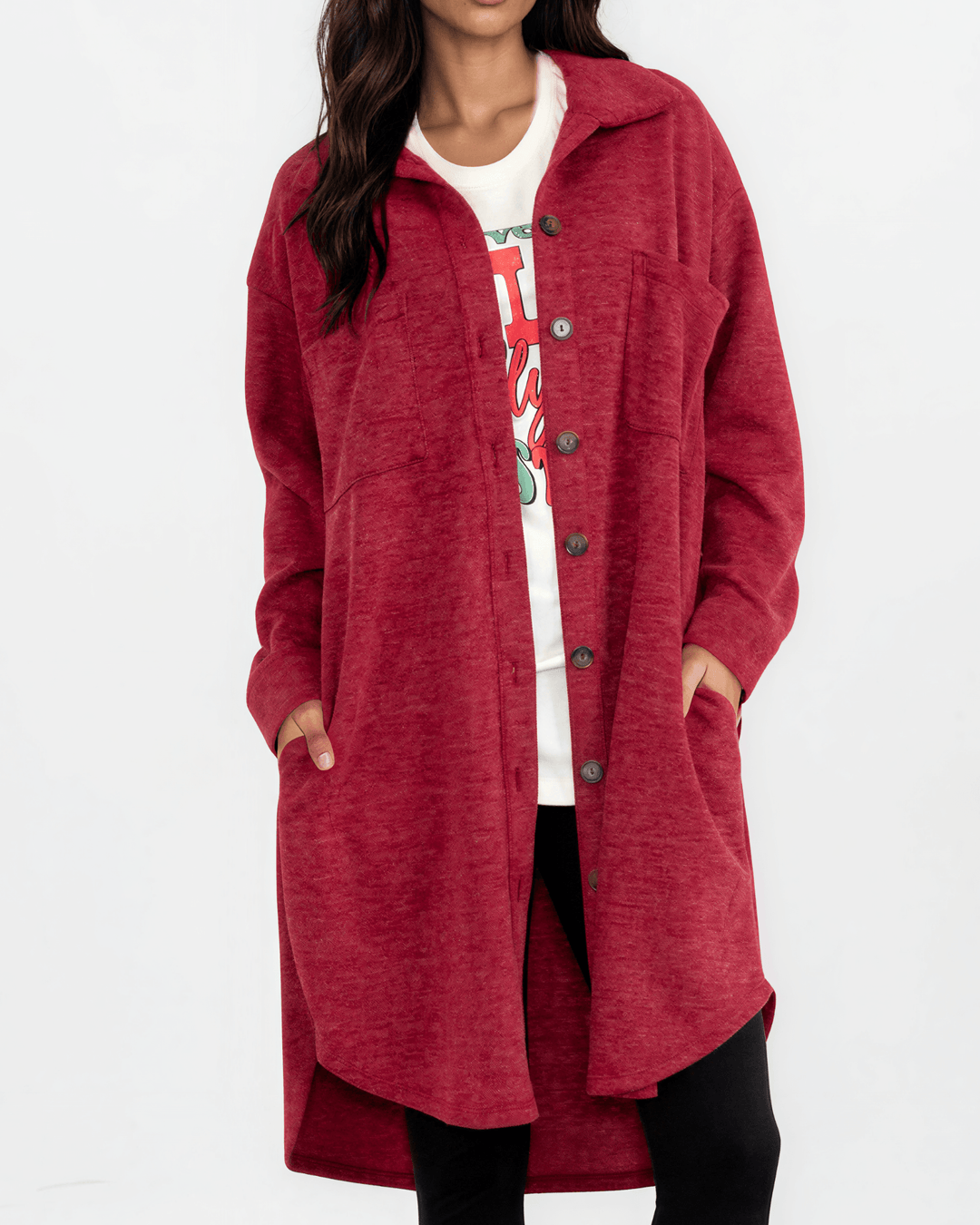 Made in USA. Layer the women's Linden longline shacket in Burgundy Red. Relaxed button-down style with soft feel, side pockets and a high-low hem.