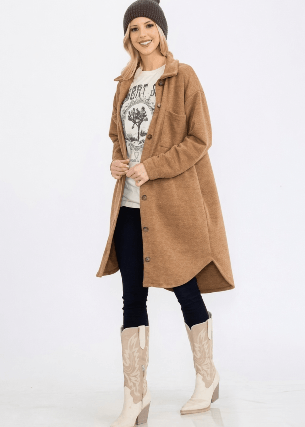 Made in USA. Layer the women's Linden longline shacket in Camel. Relaxed button-down style with soft feel, side pockets and a high-low hem.