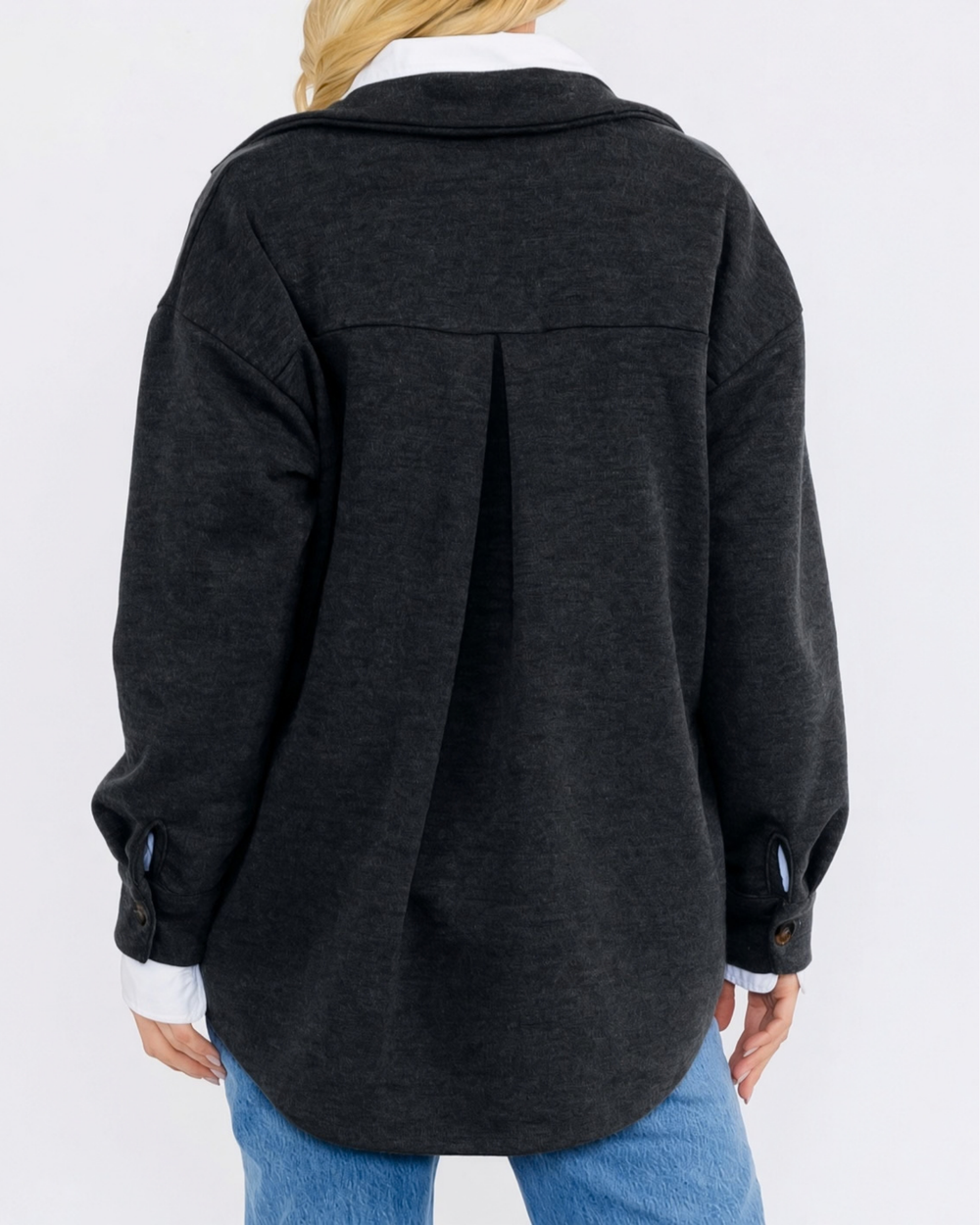 Made in USA button-down shacket with a relaxed fit, side pockets, and a medium-weight feel. Layer in Charcoal Black or Olive, sizes S–L