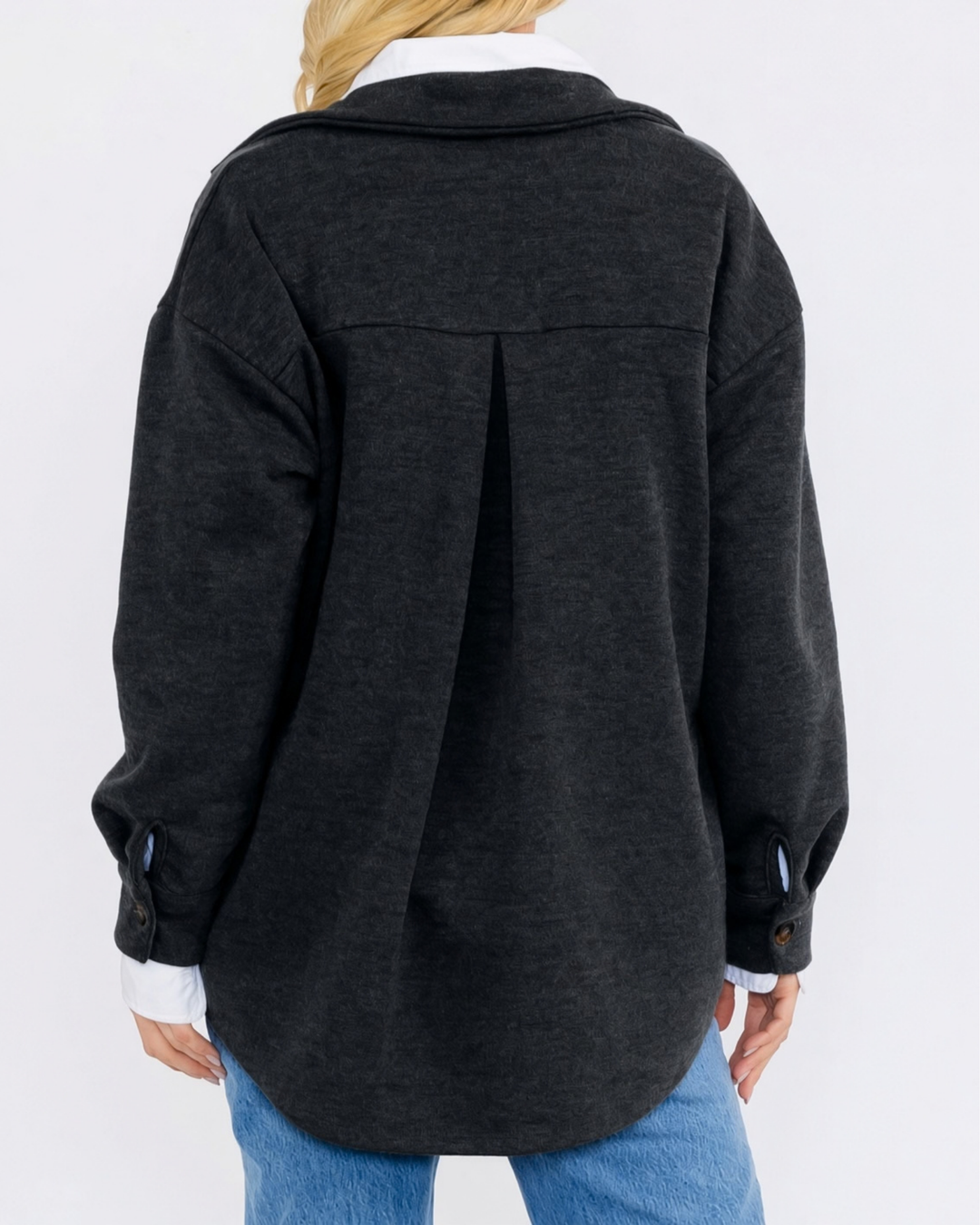 Made in USA button-down shacket with a relaxed fit, side pockets, and a medium-weight feel. Layer in Charcoal Black or Olive, sizes S–L