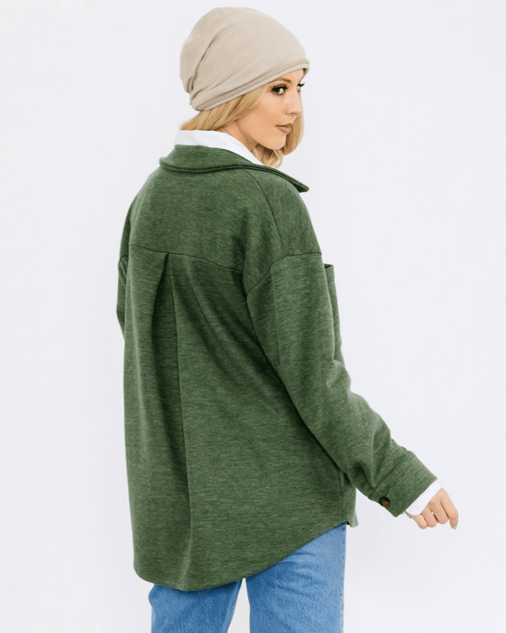 Made in USA button-down shacket with a relaxed fit, side pockets, and a medium-weight feel. Layer in Charcoal Black or Olive, sizes S–L
