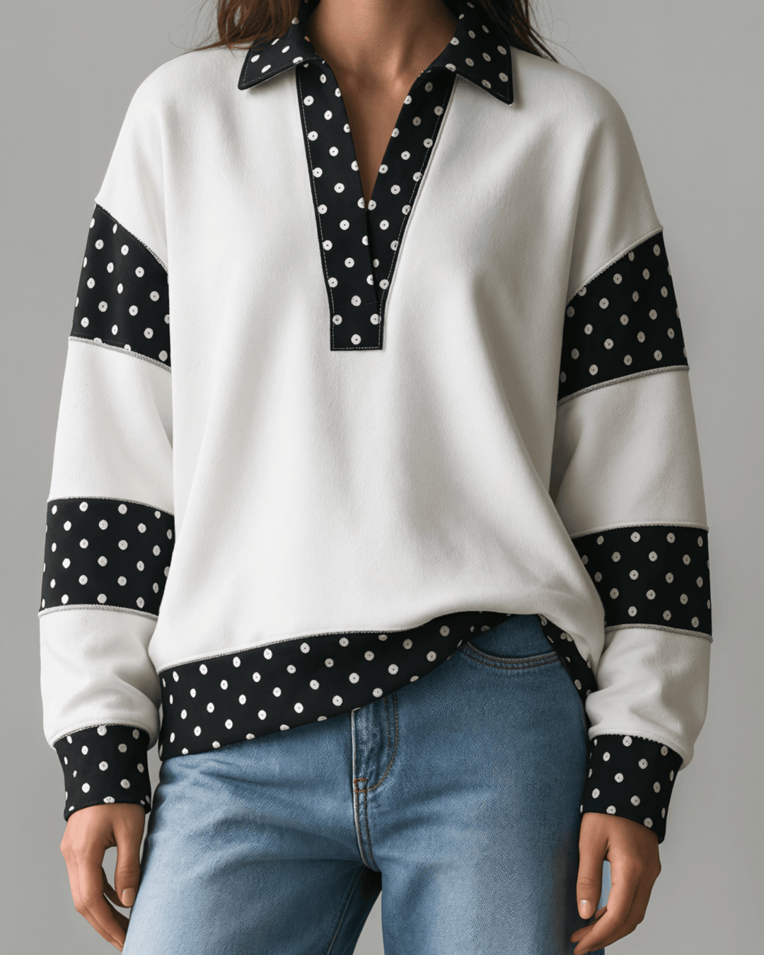 Made in USA White French terry pullover with black polka dot contrast collar, sleeves & hem. Open V-neck, relaxed fit. 95% cotton. Made in USA. Sizes S–L