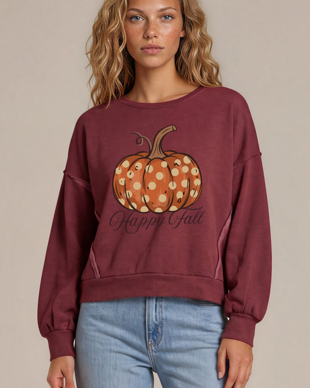 Made in USA pumpkin graphic pullover with playful “Happy Fall” lettering, raw-edge details, and an oversized boxy fit. Wine or Mocha, S–XL.