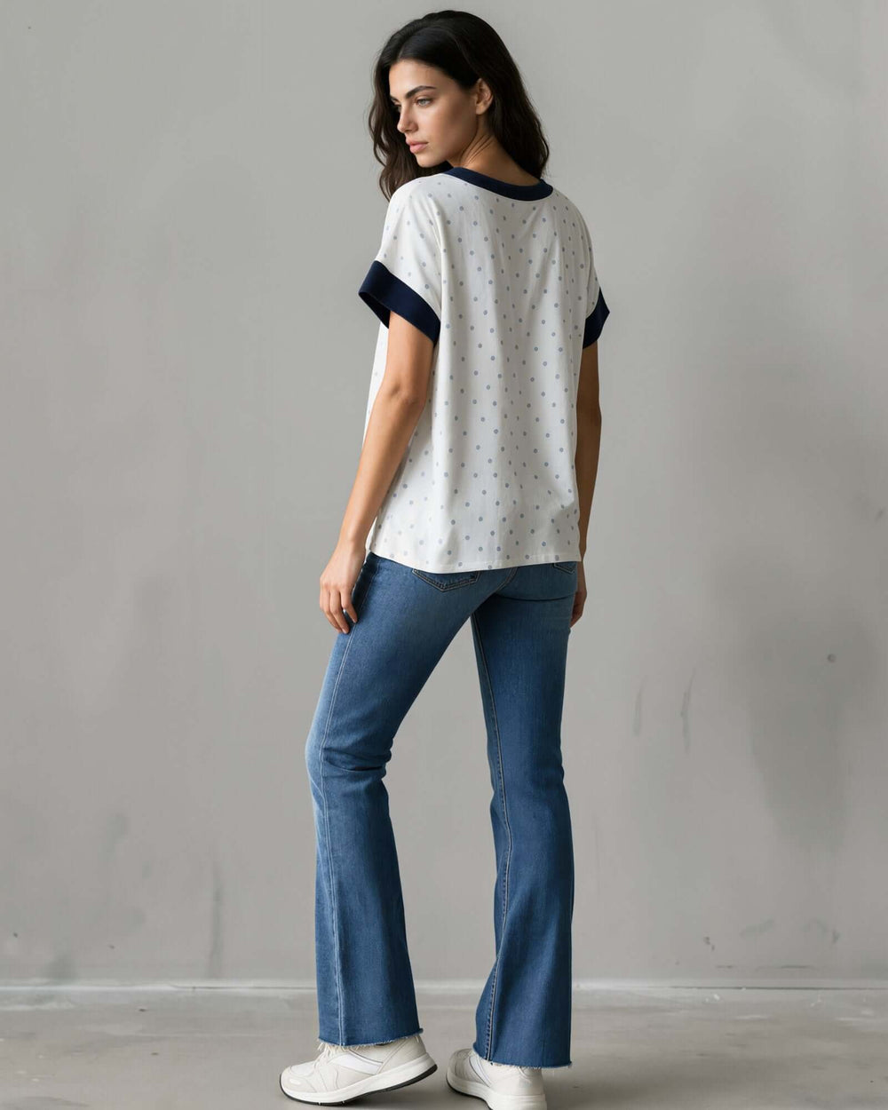 Made in USA women's white and navy polka dot split V-neck short sleeve top with navy contrast trim, back view