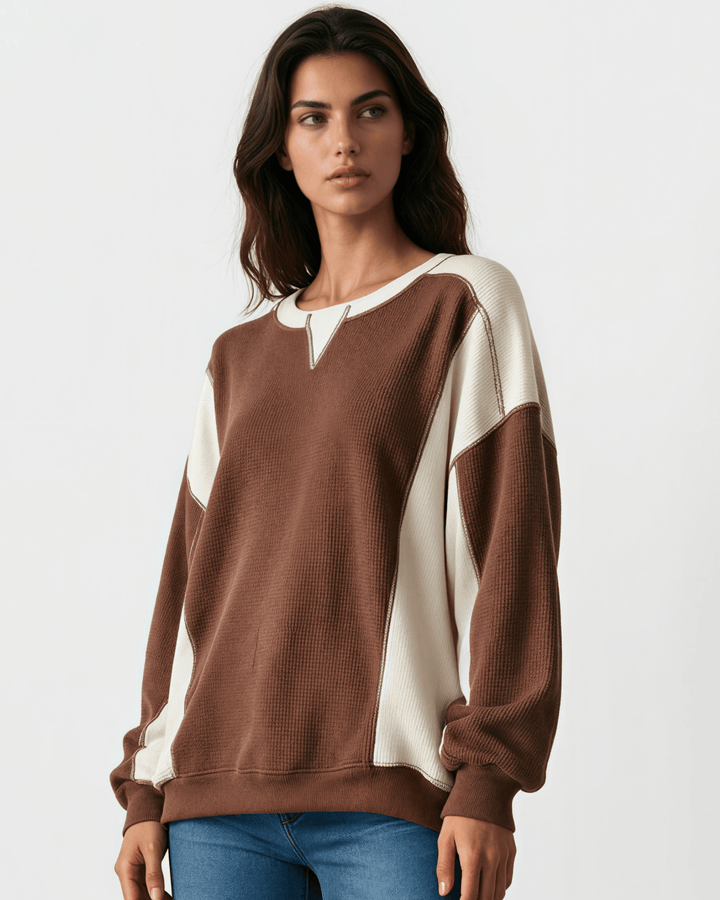 Made in USA. Nutmeg &amp; cream color block ribbed knit sweatshirt. Notched neck, exposed seams, oversized fit. 97% polyester. Sizes S–XL.