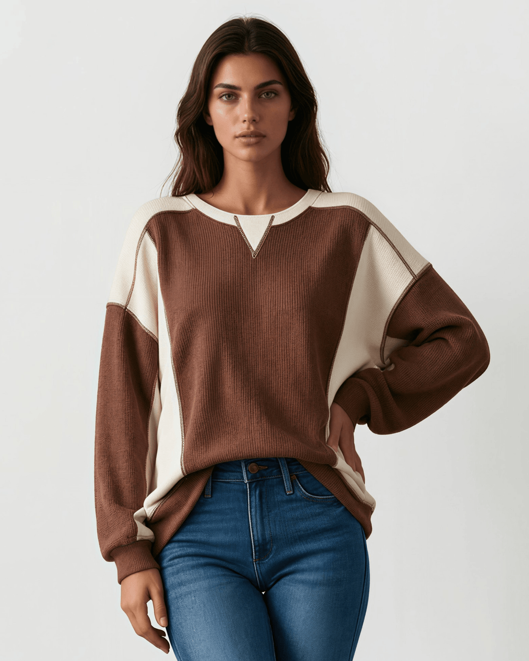 Made in USA. Nutmeg &amp; cream color block ribbed knit sweatshirt. Notched neck, exposed seams, oversized fit. 97% polyester. Sizes S–XL.