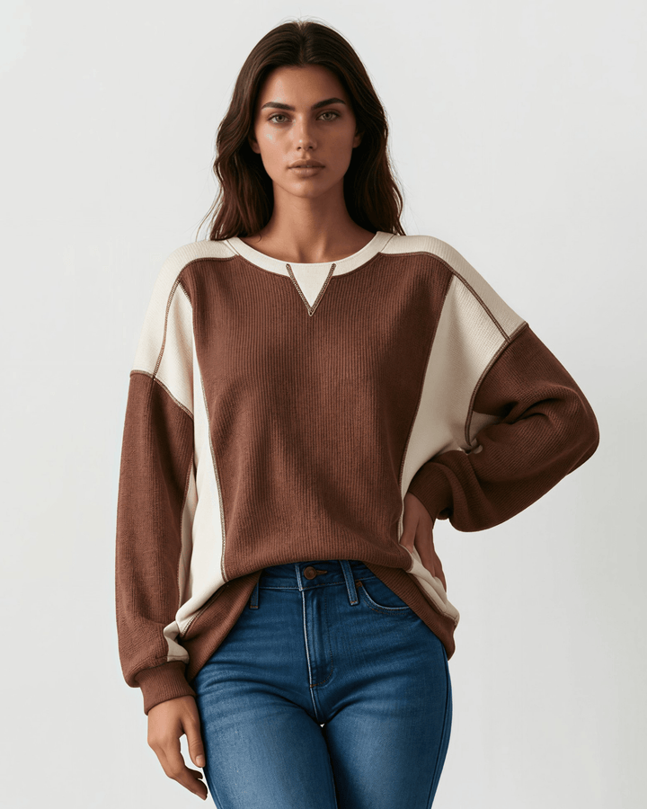 Made in USA. Nutmeg &amp; cream color block ribbed knit sweatshirt. Notched neck, exposed seams, oversized fit. 97% polyester. Sizes S–XL.