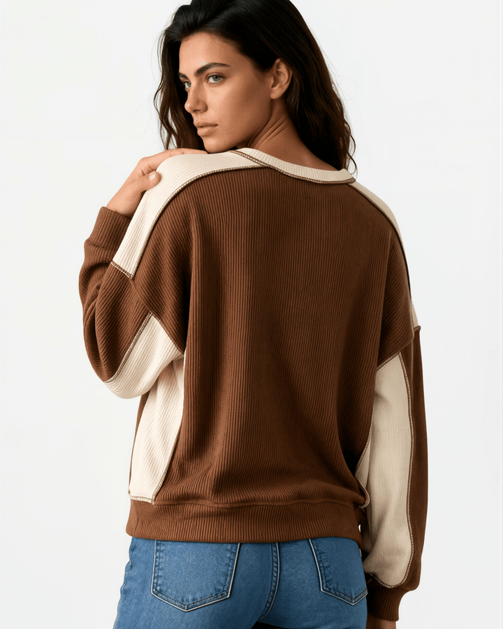 Made in USA. Nutmeg &amp; cream color block ribbed knit sweatshirt. Notched neck, exposed seams, oversized fit. 97% polyester. Sizes S–XL.