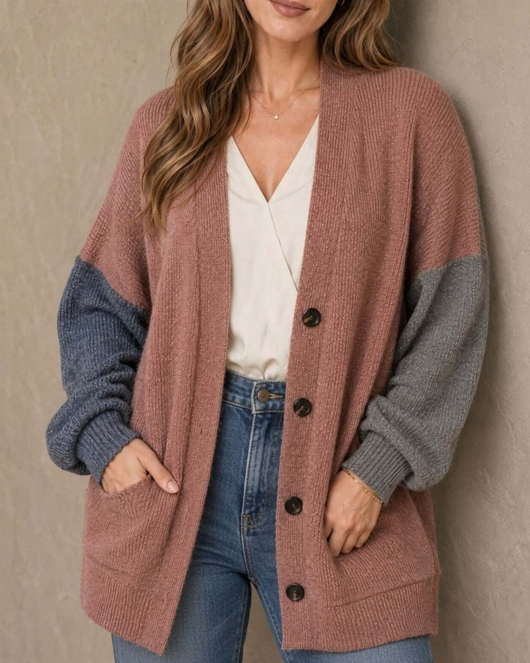 Made in USA Katie Color Block Cardigan: close-up front with hands in pockets, buttons and ribbed hem