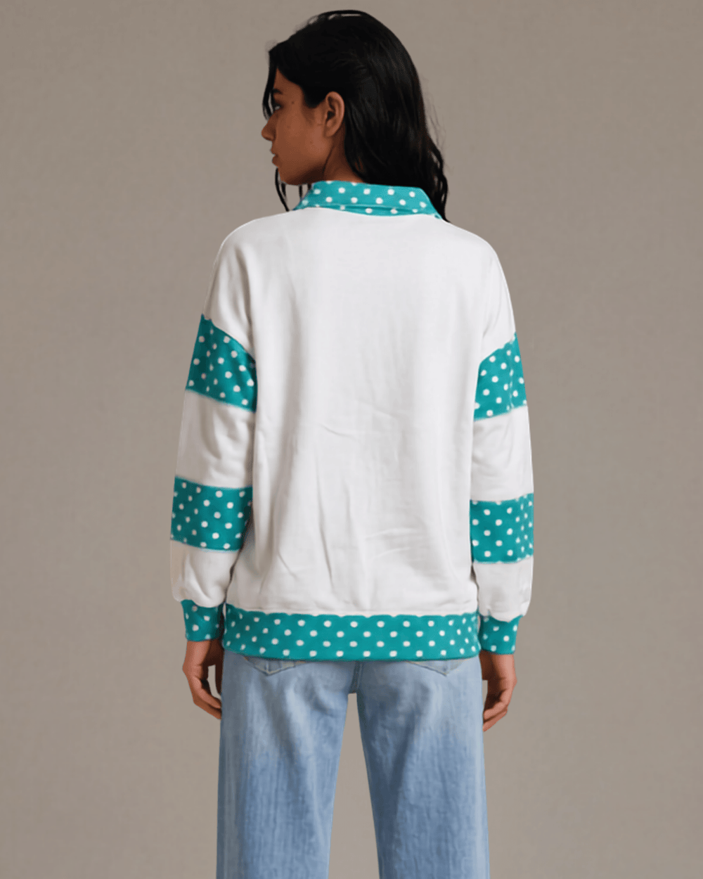 Made in USA. White French terry pullover with teal polka dot contrast collar, sleeves & hem. Open V-neck, relaxed fit. 95% cotton. Sizes S–L.