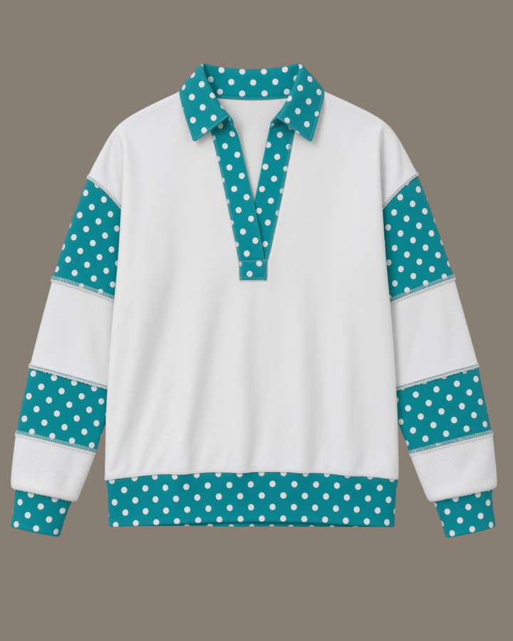 Made in USA. White French terry pullover with teal polka dot contrast collar, sleeves &amp; hem. Open V-neck, relaxed fit. 95% cotton. Sizes S–L.