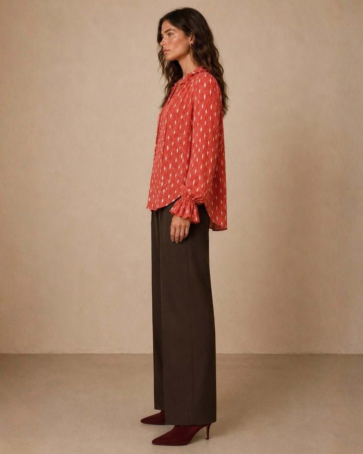 Made in USA Radiant Ruffle Neck Foil Print Blouse - Red: full-length side profile showing curved hem