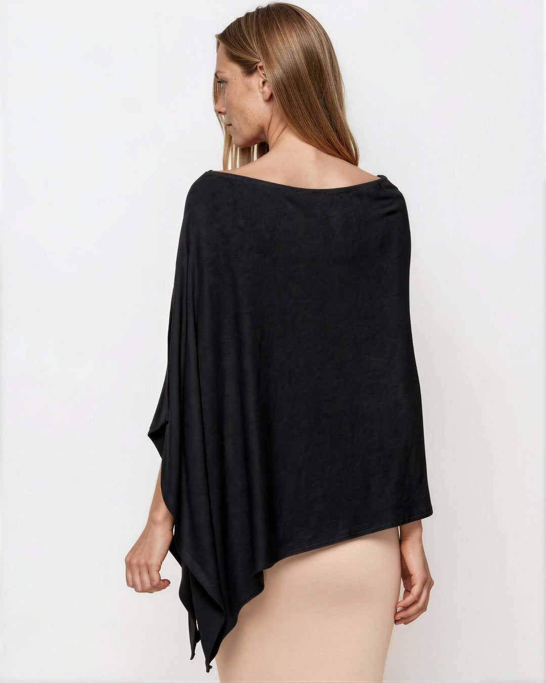 Made in USA Asymmetrical Boat Neck Poncho Top - Black: back view showing draped asymmetrical hem
