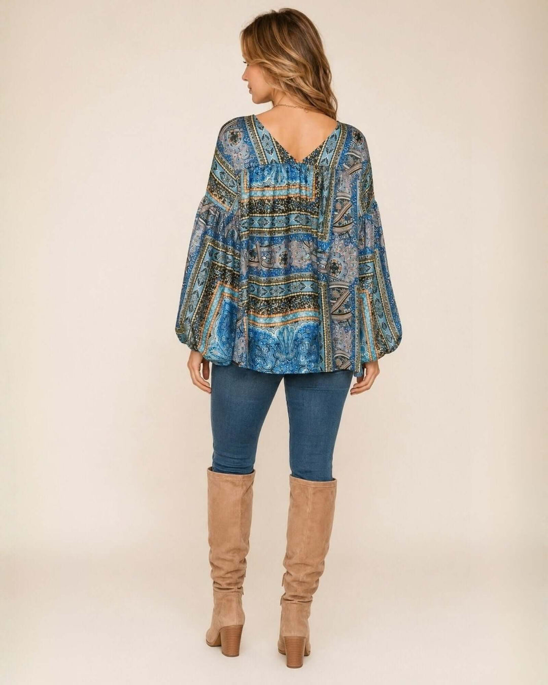 Made in USA Bella Balloon Sleeve Blouse: full-length back view with jeans and tan knee-high boots