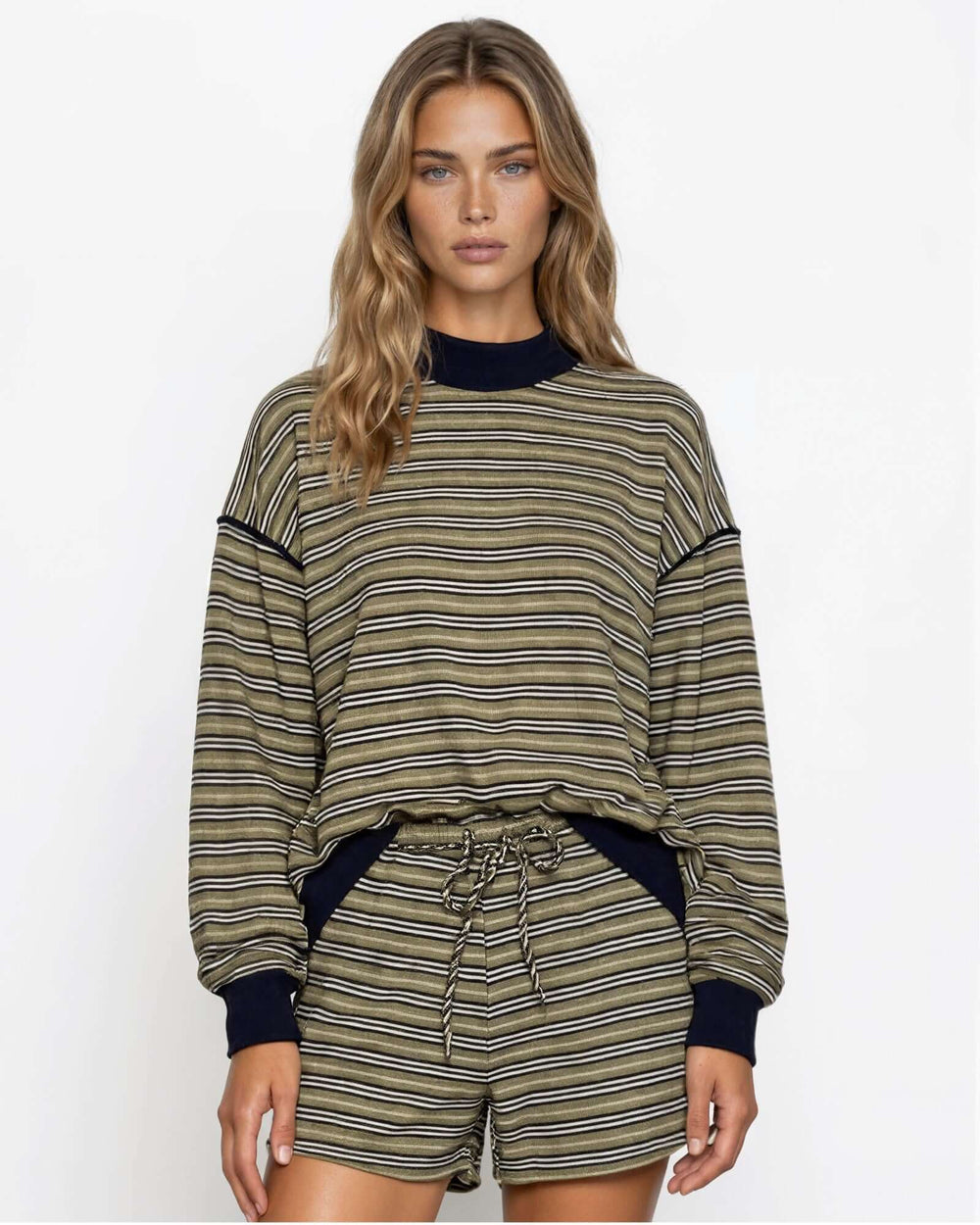 Made in USA women's olive and navy striped drawstring shorts, front view styled with matching striped top