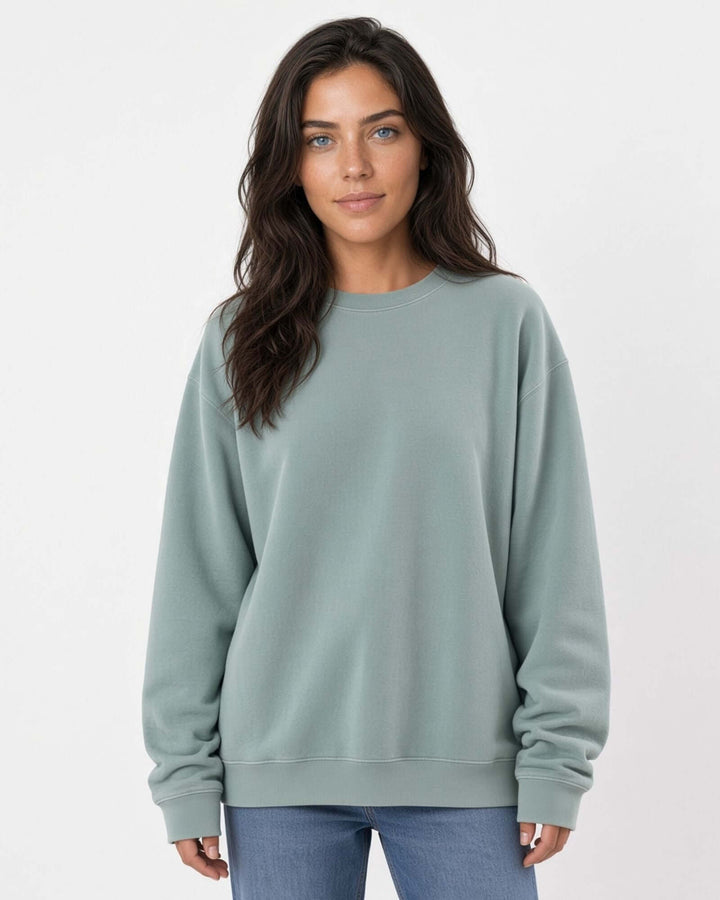Made in USA The Boyfriend Cotton Washed Sweatshirt - Fern: front view of soft sage green crew neck sweatshirt on female model with jeans