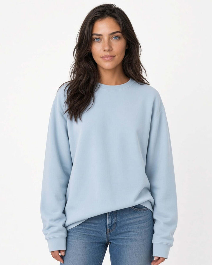 Made in USA The Boyfriend Cotton Washed Sweatshirt - Bluestone: front view of soft light blue crew neck sweatshirt on female model with jeans