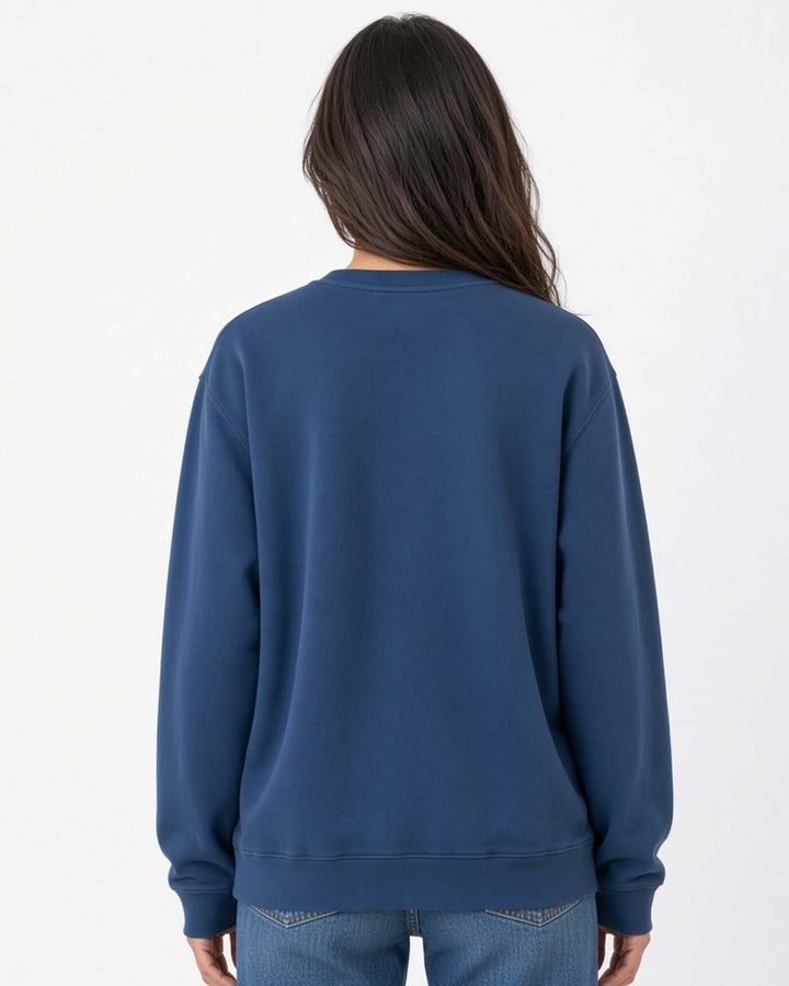 Made in USA The Boyfriend Cotton Washed Sweatshirt - Blue Steel: back view of deep blue sweatshirt on female model with jeans