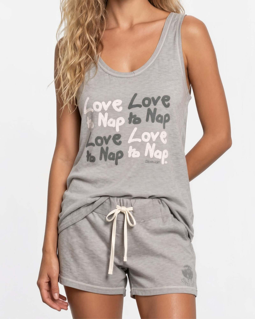 Made in USA women's gray vintage washed cotton pajama set with Love to Nap graphic tank and drawstring shorts, styled with a cream knit cardigan