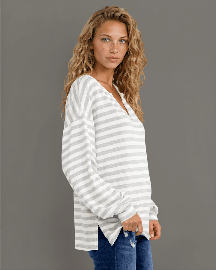 Made in USA. Grey &amp; white striped lightweight oversized pullover. Split V-neck, dropped shoulder, side slits. 68% rayon. Sizes S–XL.